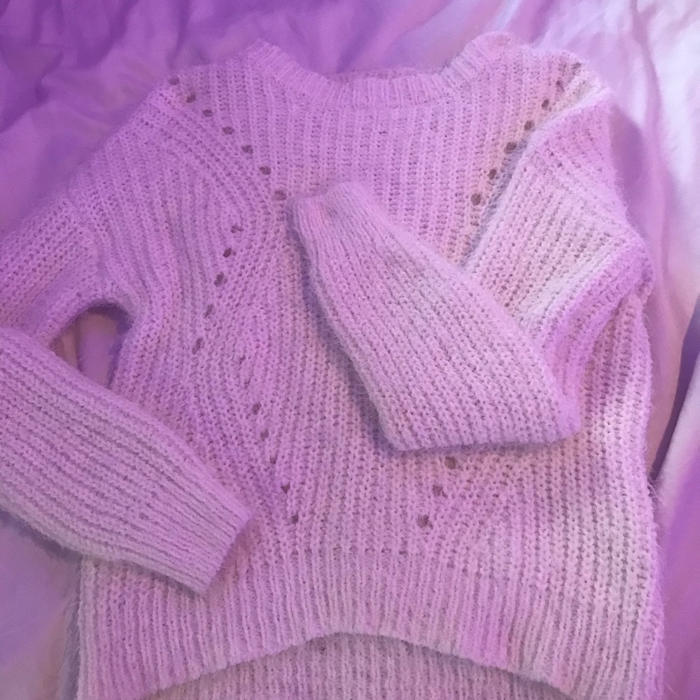 A white sweater,soft,thick.